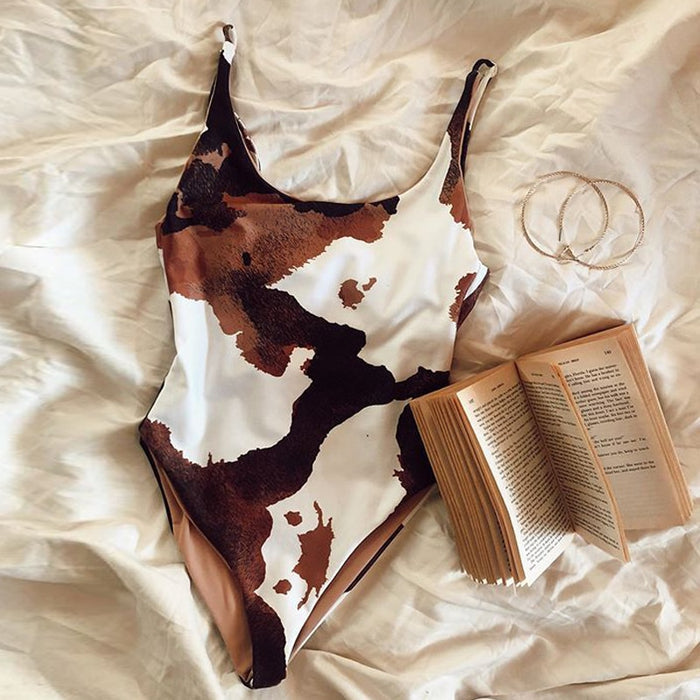 Cow Print One-Piece Swimsuit | Cross-Back Scoop Neck | The PM Edit