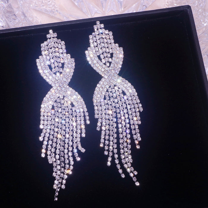 Crystal Infinity Twist Tassel Drop Earrings | Rhinestone Fringe Statement Earrings
