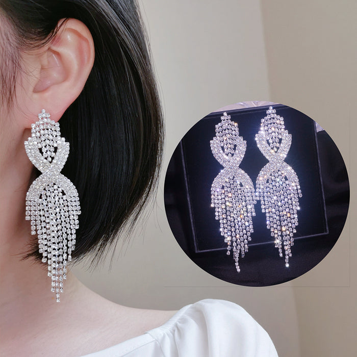 Crystal Infinity Twist Tassel Drop Earrings | Rhinestone Fringe Statement Earrings