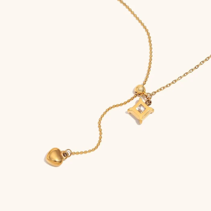 CZ Heart Tassel Necklace – Stainless Steel PVD Plated | Silver & Gold - The PM Edit