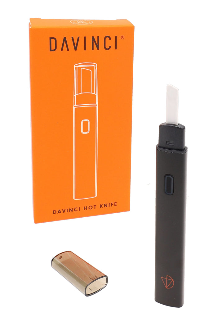 Black DaVinci hot knife with orange retail box and cap removed, angled electric dab tool for concentrates