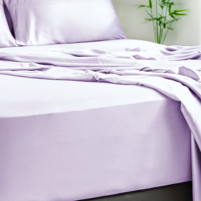 Eco Deluxe Bed Linens 4 Piece Flat Sheet Set in purple, shown in a room setting