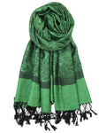 A green and black paisley pattern pashmina with fringes displayed on a white background.