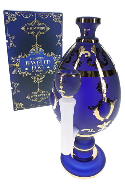 Blue 10.5-inch glass bong with oversized jeweled egg body, clear bowl, and HEMPER retail box in front view