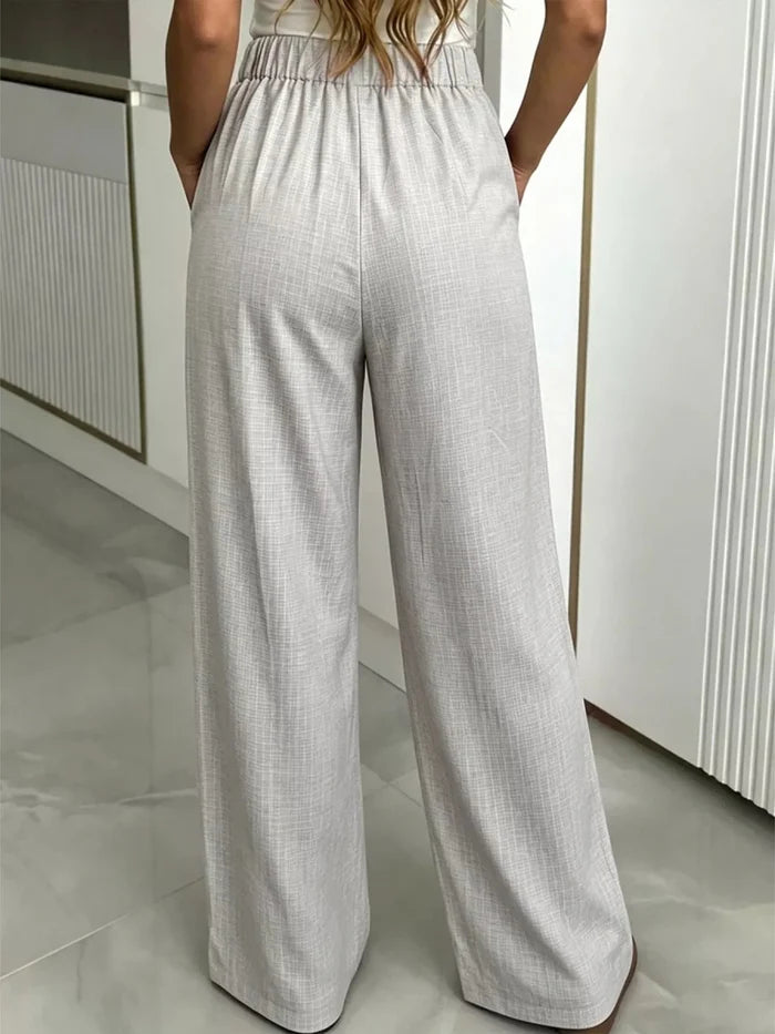 High-Waist Wide-Leg Pleated Trousers in Gray - The PM Edit