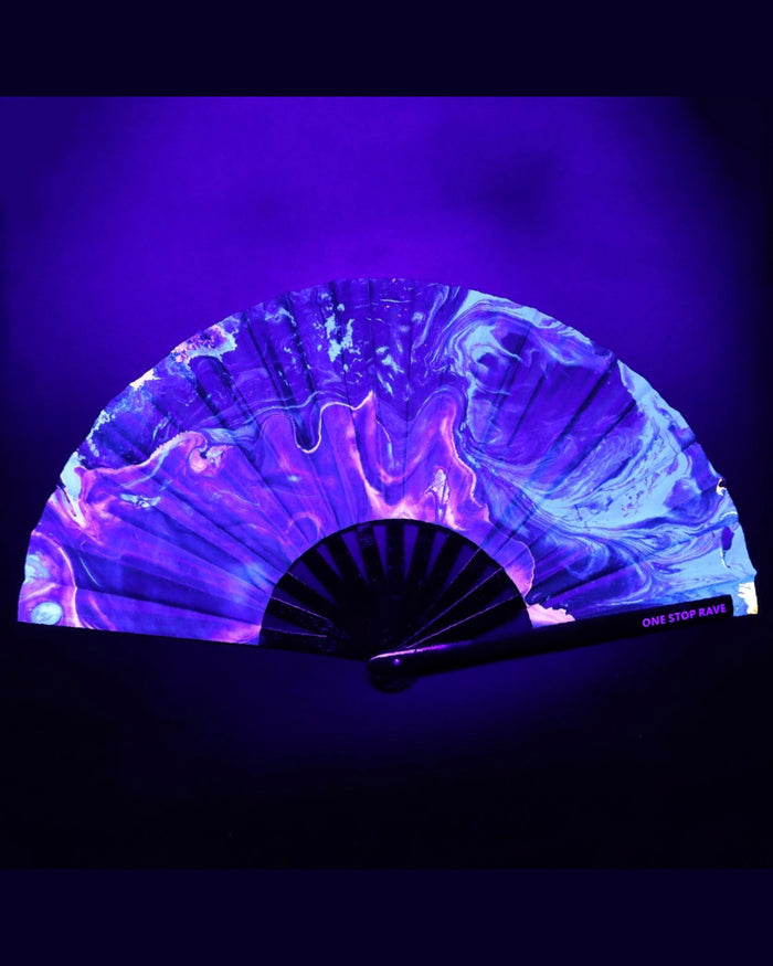 Lucy hand fan glowing purple pink under blacklight UV-Reactive