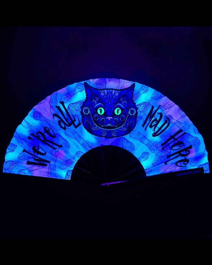 Mad Catter hand fan glowing under blacklight UV-reactive