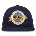 Michigan Retro Circle snapback hat in navy, front view