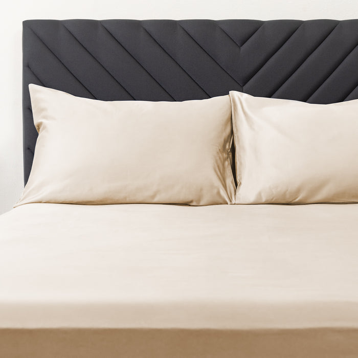 Premium Touch Bed Linens 2 Piece Pillowcase Set in brown, shown in a room setting