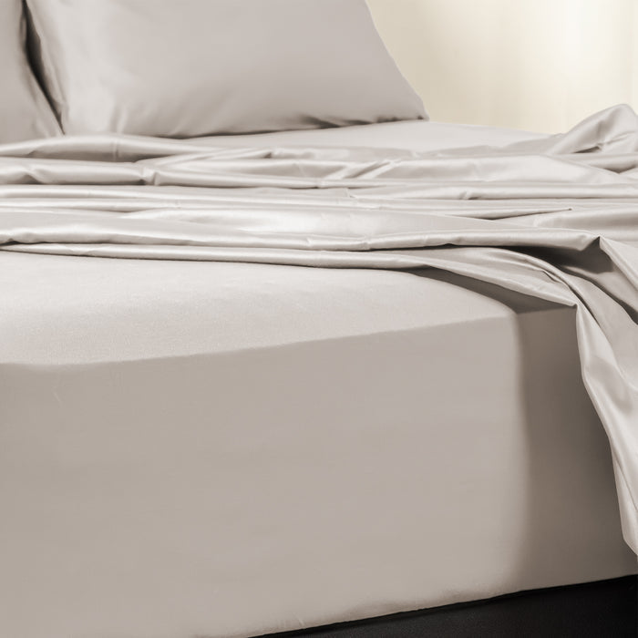 Premium Touch Bed Linens 4 Piece Flat Sheet Set in gray, shown in a room setting