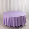 Round lavender tablecloth draped elegantly over a circular table.