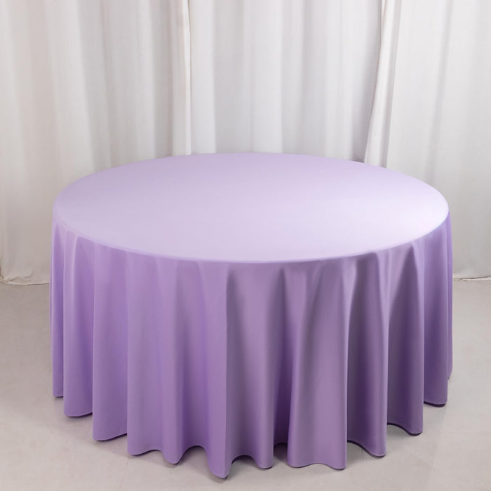 Round lavender tablecloth draping elegantly over a table