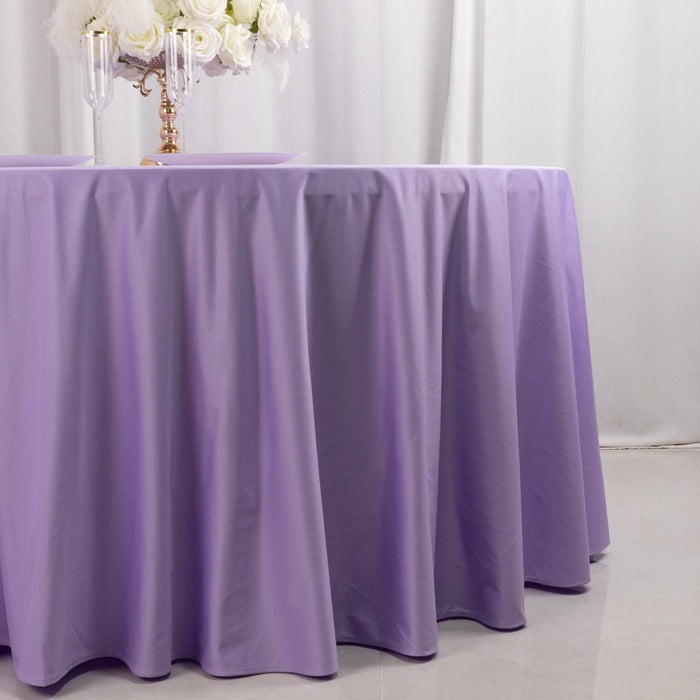 Lavender tablecloth draped elegantly over a table for events or gatherings.