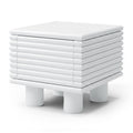 White modern side table with ribbed texture on a white background