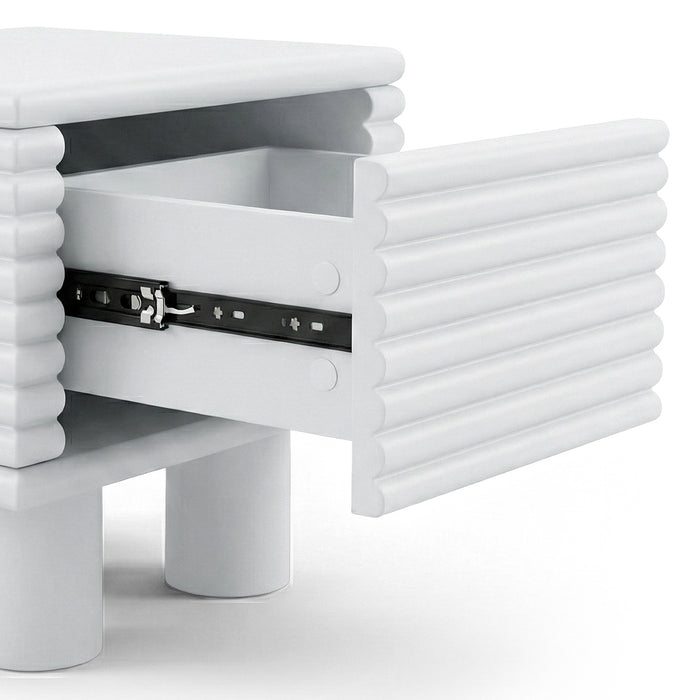 White side table with ribbed texture and open drawer showing interior on white background