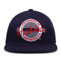 UConn Retro Circle snapback hat in navy, front view