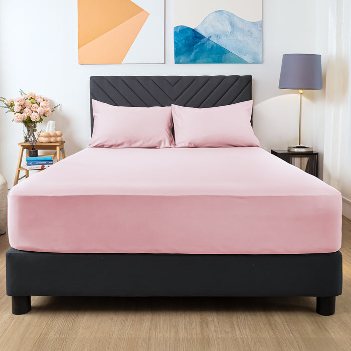 Wink Bed Linens 3 Piece Fitted Sheet Set in pink, shown in a room setting